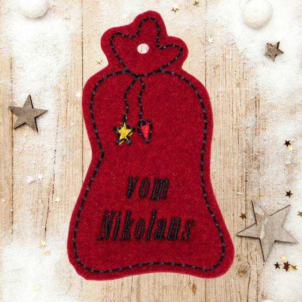 Wollfilz Anhänger vom Nikolaus 8,5 x 5 cm Geschenkesack auf rotem Wollfilz 3mm -sofort lieferbar-