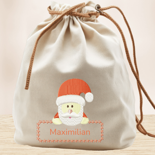 Preview: Stickdatei Weihnachtsmann mit Schild für individuellen Name